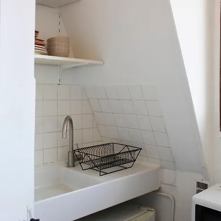 Bright Nest With A Small View On The Eiffel Tower